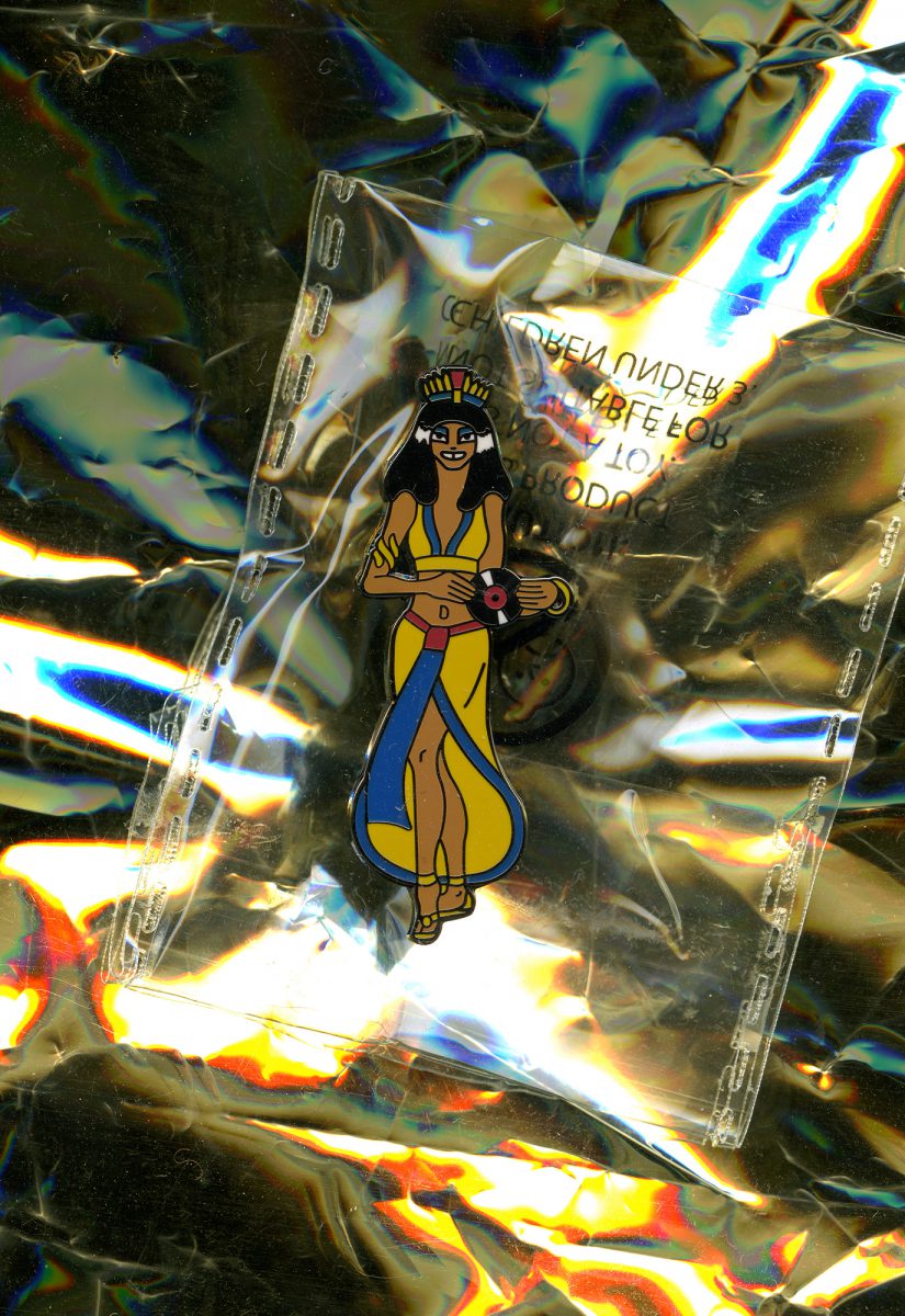 		Cleo enamel badge